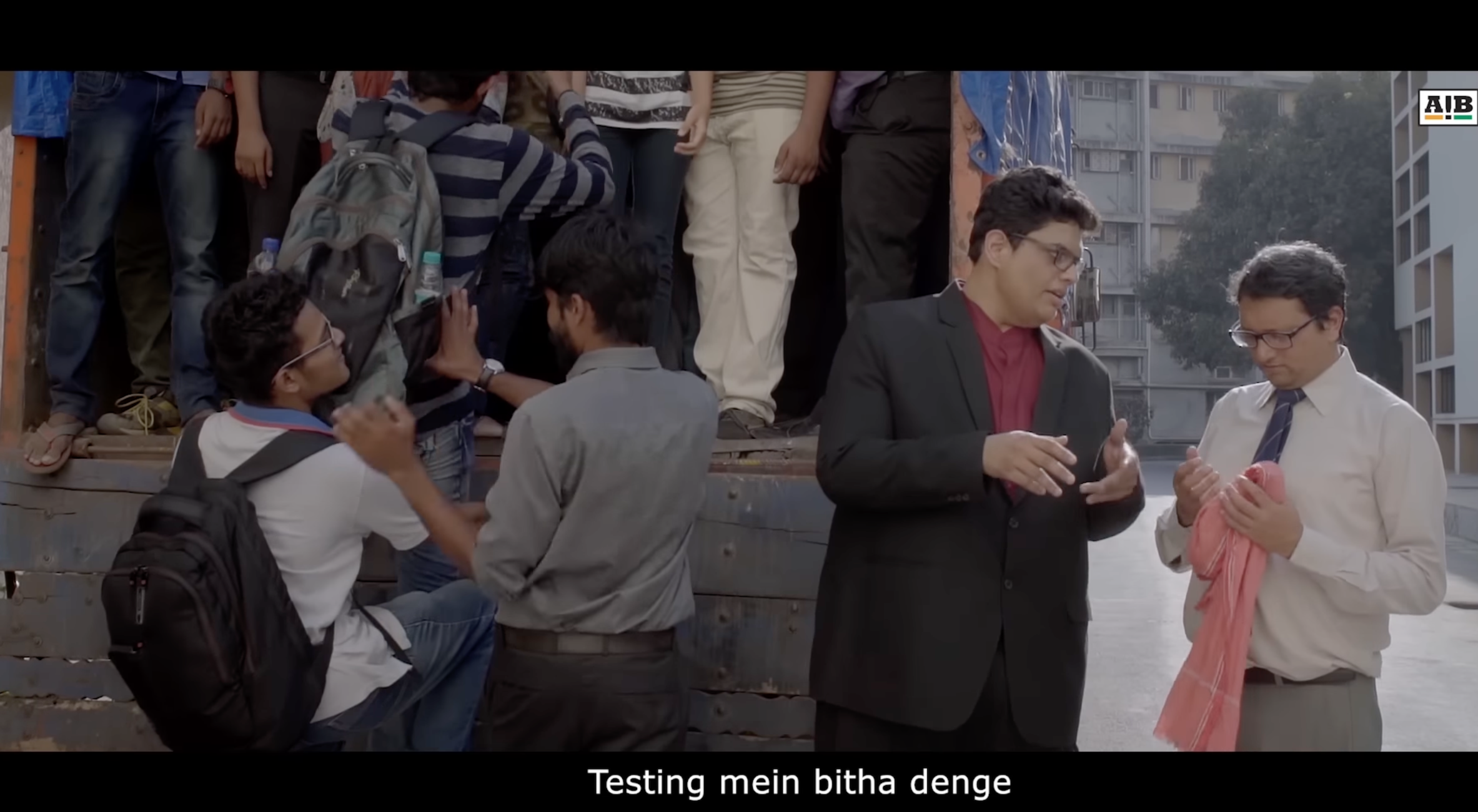 AIB sketch still, subtitle: Testing mein bitha denge